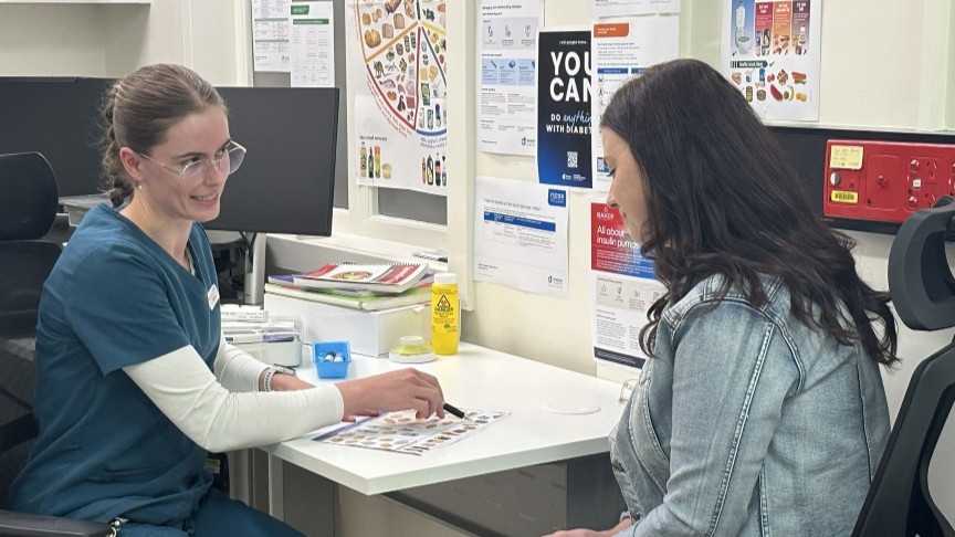 Dietician with patient for new diabetes service model