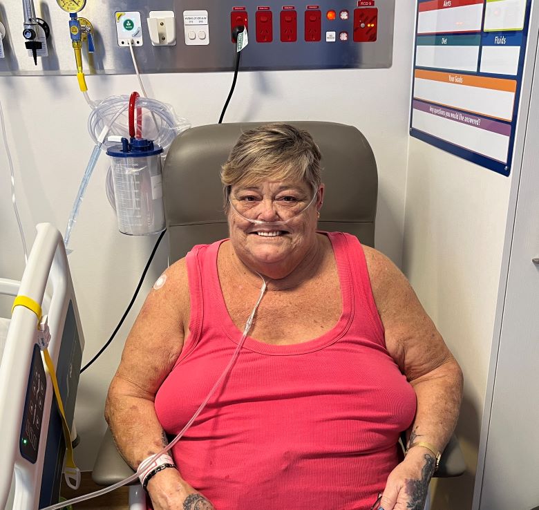 Hospital patient sitting in chair