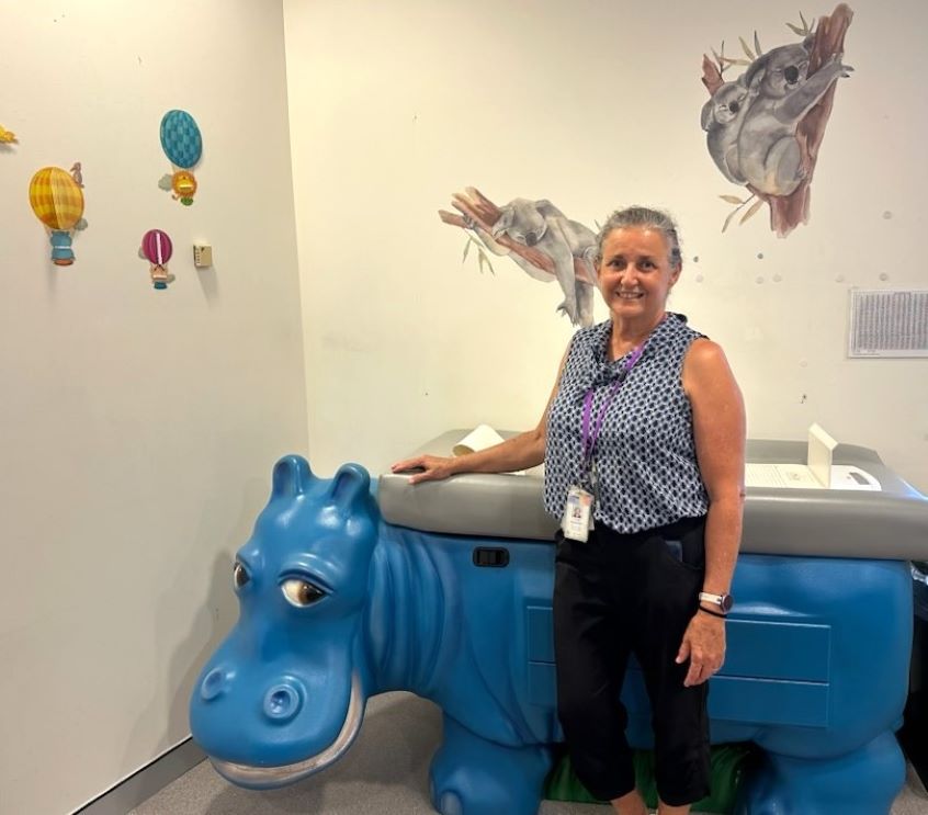 Nurse in child health assessment room
