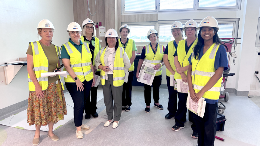 Group of intensive care hospital workers in intensive care unit that is being built